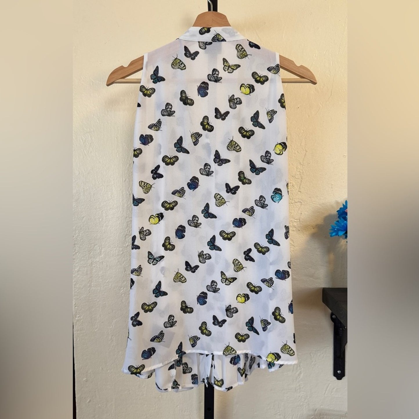 White Sleeveless Button-Down Blouse with Butterfly Print